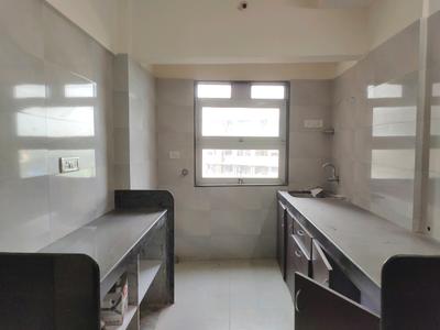 Kitchen Image of 1000 Sq.ft 2 BHK Apartment / Flat for sale in Rajendra Dolphin Tower, Malad West Mumbai for Rs. 14400000