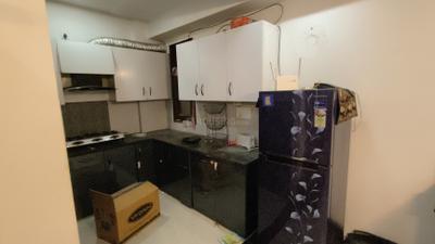 Kitchen Image of 1100 Sq.ft 2 BHK Apartment / Flat for rent in Sector 30 Gurgaon for Rs. 45000