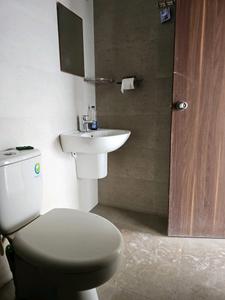 Common Bathroom Image of 1064 Sq.ft 2 BHK Apartment / Flat for sale in Belvalkar Solacia, Wagholi Pune for Rs. 6350000