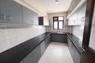 Kitchen Image of 1400 Sq.ft 2 BHK Apartment / Flat for rent in Basera CGHS, Sector 56 Gurgaon for Rs. 48000
