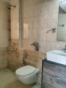 Common Bathroom Image of 600 Sq.ft 1 BHK Apartment / Flat for rent in Puraniks Grand Central, Thane West Thane for Rs. 26000