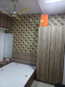 Bedroom Image of 1300 Sq.ft 2 BHK Duplex for rent in Navnirman Shubhlaxmi Residency, Dindoli Surat for Rs. 20000