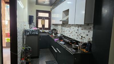 Kitchen Image of 860 Sq.ft 2 BHK Builder Floor for rent in Dwarka Mor New Delhi for Rs. 16000