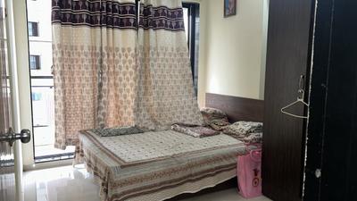 Bedroom Image of 1250 Sq.ft 2 BHK Apartment / Flat for rent in Thakurli Thane for Rs. 18000