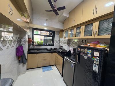 Kitchen Image of 950 Sq.ft 2 BHK Apartment / Flat for sale in Shree Nath CHS, Kopar Khairane Navi Mumbai for Rs. 16000000