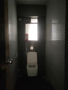 Common Bathroom Image of 550 Sq.ft 1 BHK Apartment / Flat for sale in Sangam Emporio Towers, Kandivali West Mumbai for Rs. 9800000
