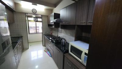 Kitchen Image of 1250 Sq.ft 3 BHK Apartment / Flat for rent in Ekta Meadows, Borivali East Mumbai for Rs. 110000