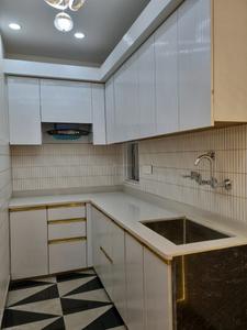 Kitchen Image of 600 Sq.ft 2 BHK Apartment / Flat for sale in Hans Builders Floor, Dwarka Mor New Delhi for Rs. 4500000