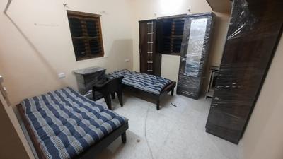 Bedroom Image of Nisarg's PG in Sector 6, Gandhinagar