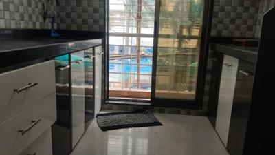 Kitchen Image of 695 Sq.ft 1 BHK Apartment / Flat for rent in Kalamboli Navi Mumbai for Rs. 21000