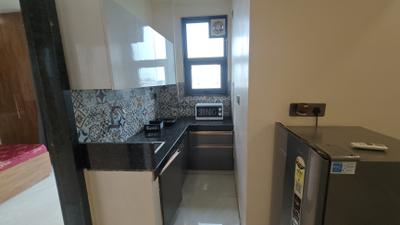 Kitchen Image of 800 Sq.ft 1 BHK Builder Floor for rent in Sector 52 Gurgaon for Rs. 30000