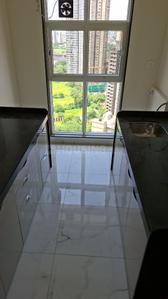 Kitchen Image of 650 Sq.ft 2 BHK Apartment / Flat for rent in MICL Aaradhya Parkwood, Mira Road East Mira Bhayandar for Rs. 36000