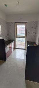 Kitchen Image of 990 Sq.ft 2.5 BHK Apartment / Flat for sale in N B Bhalchandra Akashvan, Punawale Pune for Rs. 8000000