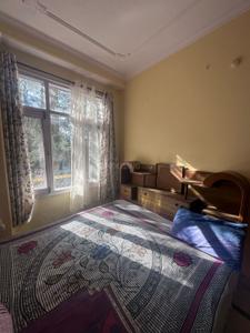 Bedroom Image of 1100 Sq.ft 2 BHK Independent House for rent in Kasumpti Shimla for Rs. 22000