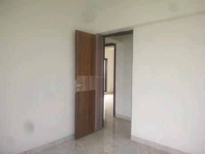 Bedroom Image of 910 Sq.ft 3 BHK Apartment / Flat for sale in Tharwani Vedant Millenia, Titwala Thane for Rs. 6100000