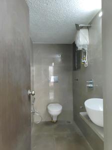Common Bathroom Image of 620 Sq.ft 1 BHK Apartment / Flat for sale in Mansarovar Pearl Gardens, Vasai West Vasai for Rs. 4490000