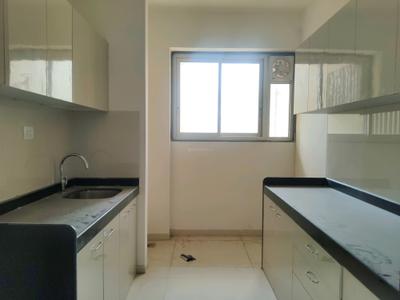 Kitchen Image of 691 Sq.ft 2 BHK Apartment / Flat for rent in Runwal Sanctuary, Mulund West Mumbai for Rs. 60000