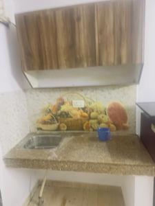 Kitchen Image of 200 Sq.ft 1 RK Studio for rent in Sector 24 Gurgaon for Rs. 10000