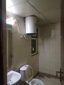 Common Bathroom Image of 990 Sq.ft 2 BHK Apartment / Flat for sale in Mahindra Aura, Sector 110A Gurgaon for Rs. 14900000