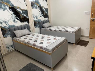 Bedroom Image of Gauri PG in Sector 52, Noida