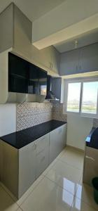 Kitchen Image of 523 Sq.ft 1 BHK Apartment / Flat for rent in Urbanrise Revolution One, Padur Chennai for Rs. 22000