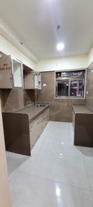 Kitchen Image of 1100 Sq.ft 2 BHK Apartment / Flat for sale in Vishesh Balaji Symphony, Shilottar Raichur Navi Mumbai for Rs. 8500000
