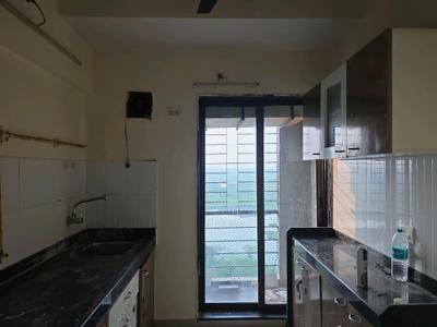 Kitchen Image of 835 Sq.ft 2 BHK Apartment / Flat for sale in Acropolis, Virar West Virar for Rs. 3999000