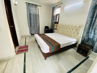Bedroom Image of Urbanroomz Coliving PG in Sector 45, Gurgaon