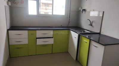 Kitchen Image of 900 Sq.ft 2 BHK Apartment / Flat for rent in Spine Road Pune for Rs. 18000