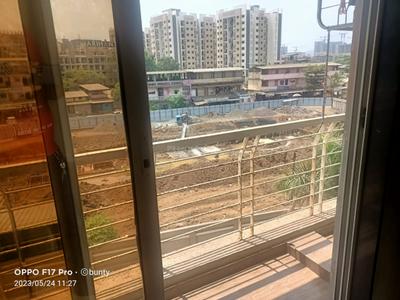 Balcony Image of 615 Sq.ft 1 BHK Apartment / Flat for rent in Kamdhenu Gardenia, Taloja Navi Mumbai for Rs. 11000