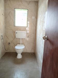 Common Bathroom Image of 685 Sq.ft 1 BHK Apartment / Flat for sale in Pushpak Nagar Navi Mumbai for Rs. 4325000