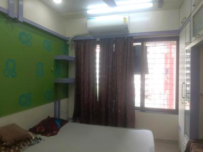 Bedroom Image of 920 Sq.ft 2 BHK Apartment / Flat for sale in Bhoomi Rock Enclave, Kandivali West Mumbai for Rs. 19400000