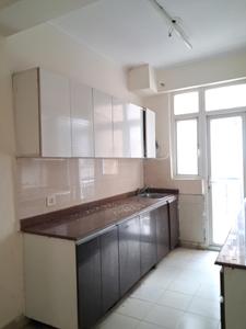Kitchen Image of 1325 Sq.ft 3 BHK Apartment / Flat for sale in Amrapali Zodiac by Amrapali Group, Sector 120 Noida for Rs. 11600000