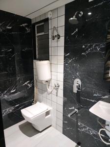 Common Bathroom Image of 650 Sq.ft 1 BHK Apartment / Flat for sale in Om Paraiso, Khidkali Thane for Rs. 3995000
