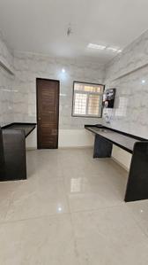 Kitchen Image of 800 Sq.ft 2 BHK Apartment / Flat for rent in Veddant Ganesh Bella Rossa, Punawale Pune for Rs. 23000