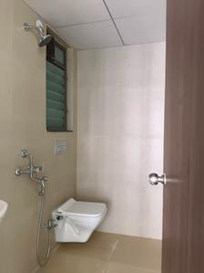 Common Bathroom Image of 790 Sq.ft 2 BHK Apartment / Flat for rent in Runwal My City Phase II Cluster 05 Part I, Usarghar Thane for Rs. 14000