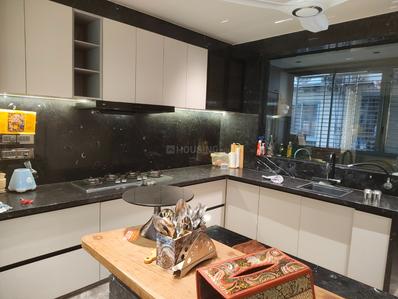 Kitchen Image of 2400 Sq.ft 4 BHK Apartment / Flat for rent in Rajhans Grandezza, Bharthana Surat for Rs. 150000