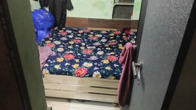 Bedroom Image of 450 Sq.ft 1.5 BHK Independent House for rent in Goregaon West Mumbai for Rs. 28000