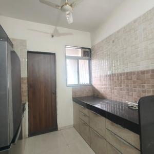 Kitchen Image of 670 Sq.ft 1 BHK Apartment / Flat for rent in Kalpataru Estate, Pimple Gurav Pune for Rs. 20000