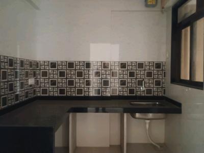 Kitchen Image of 950 Sq.ft 3 BHK Apartment / Flat for sale in Thakurli Thane for Rs. 10500000