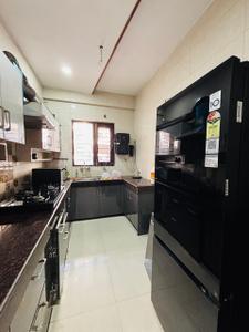 Kitchen Image of 1587 Sq.ft 3 BHK Apartment / Flat for sale in Kishanpura Zirakpur for Rs. 9190000