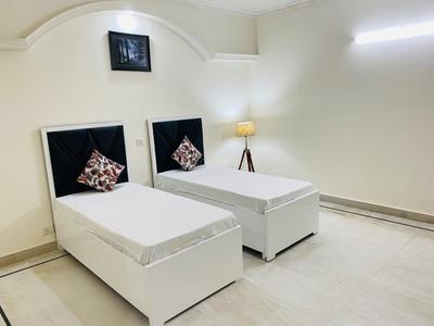 Bedroom Image of Premium Girls PG Near Dlf Cyberhub in DLF Phase 2, Gurgaon
