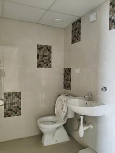 Common Bathroom Image of 950 Sq.ft 2 BHK Apartment / Flat for sale in Rustomjee La Familia, Thane West Thane for Rs. 15000000