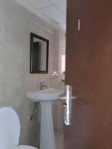 Common Bathroom Image of 1185 Sq.ft 3 BHK Apartment / Flat for sale in NBCC Tropical Garden, Noida Extension Greater Noida for Rs. 8631400