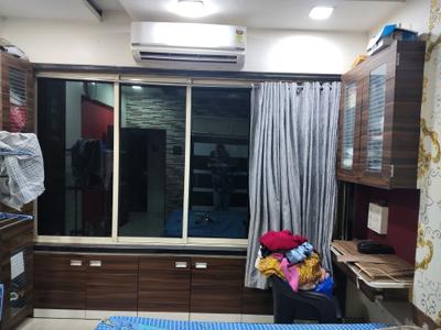 Bedroom Image of 550 Sq.ft 1 BHK Apartment / Flat for rent in Puraniks Kanchan Pushp Society, Kasarvadavali Thane for Rs. 17999