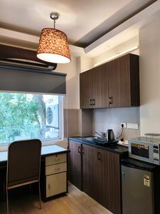 Kitchen Image of 450 Sq.ft 1 BHK Builder Floor for rent in Sector 43 Gurgaon for Rs. 45000