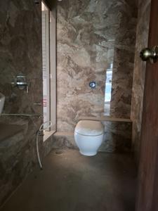 Common Bathroom Image of 1100 Sq.ft 2 BHK Apartment / Flat for sale in Krishna Aura NX, Kharghar Navi Mumbai for Rs. 11500000
