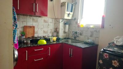 Kitchen Image of 700 Sq.ft 1 BHK Builder Floor for rent in Sector 14 Gurgaon for Rs. 24000