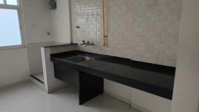 Kitchen Image of 707 Sq.ft 1 BHK Apartment / Flat for sale in Nyati Elan Central, Wagholi Pune for Rs. 4450000