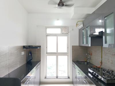 Kitchen Image of 1100 Sq.ft 3 BHK Apartment / Flat for rent in Godrej Emerald, Kasarvadavali Thane for Rs. 36000